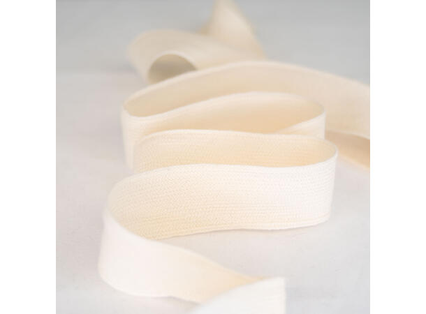 Strikket ullbånd, ecru