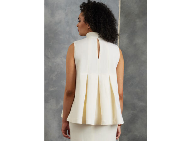 Vogue 1909 - Topp med høy krage.