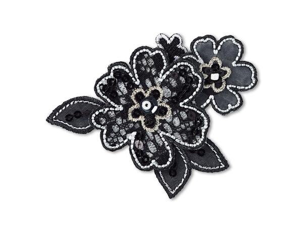 Applikasjon, svart blomst